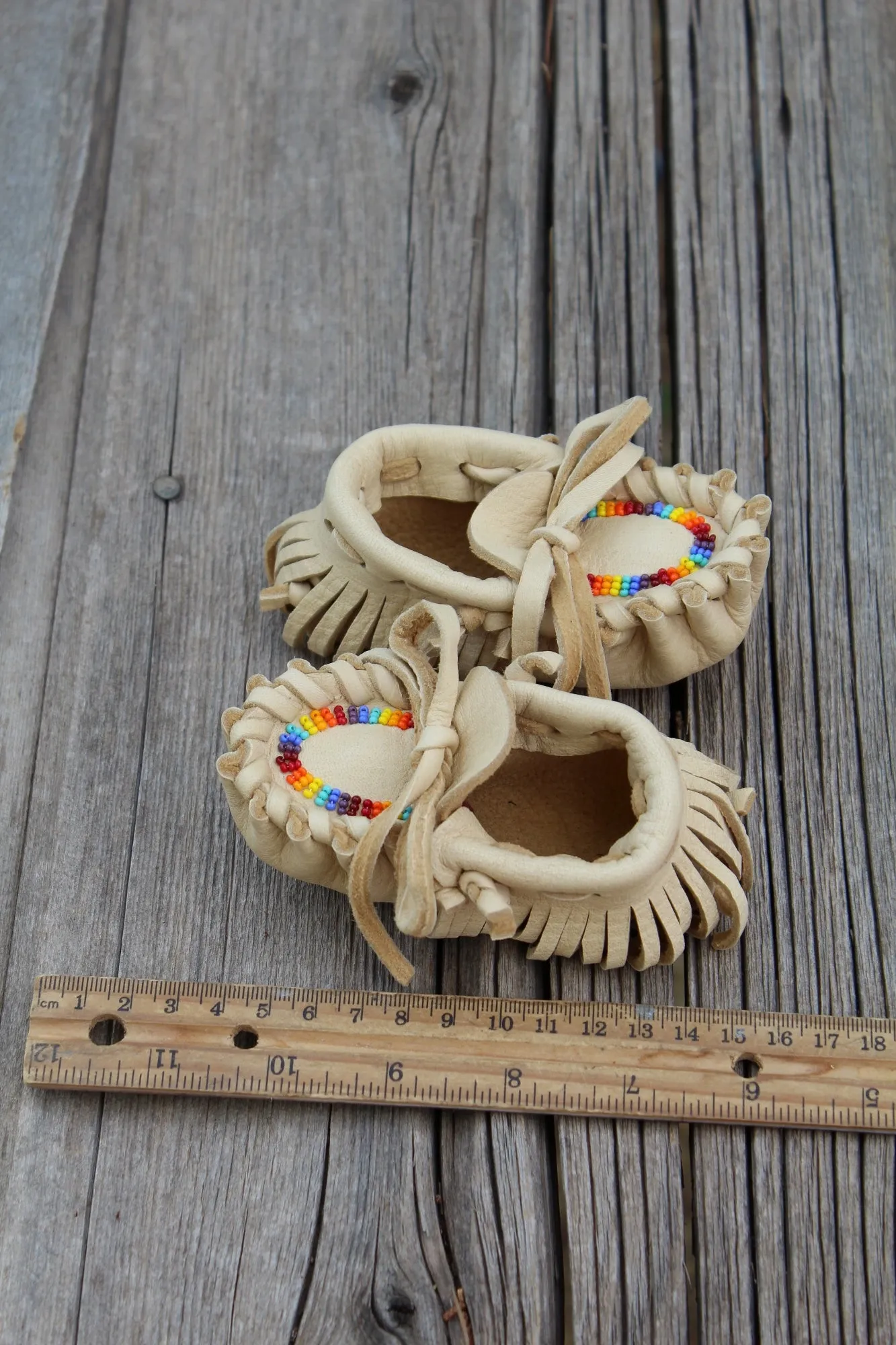 Beaded baby moccasins, fringed moccasins