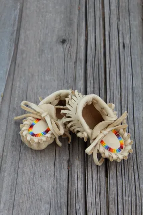 Beaded baby moccasins, fringed moccasins